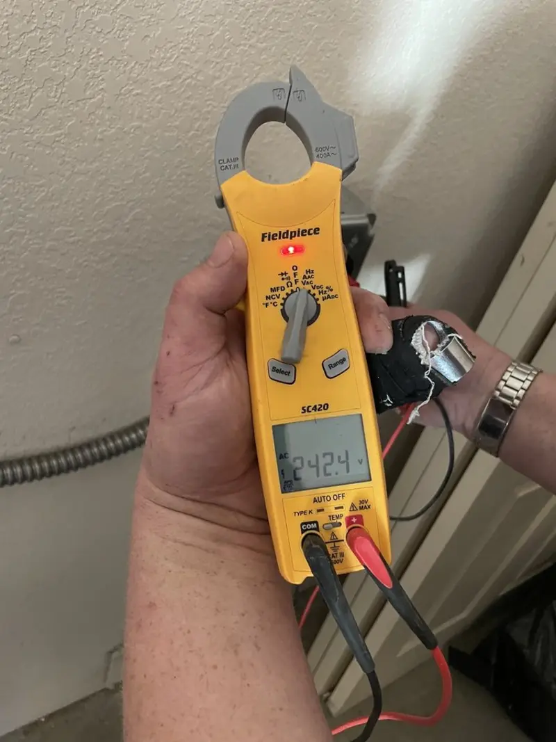 Voltage testing with clamp meter during Generator Installation in Hubbardston
